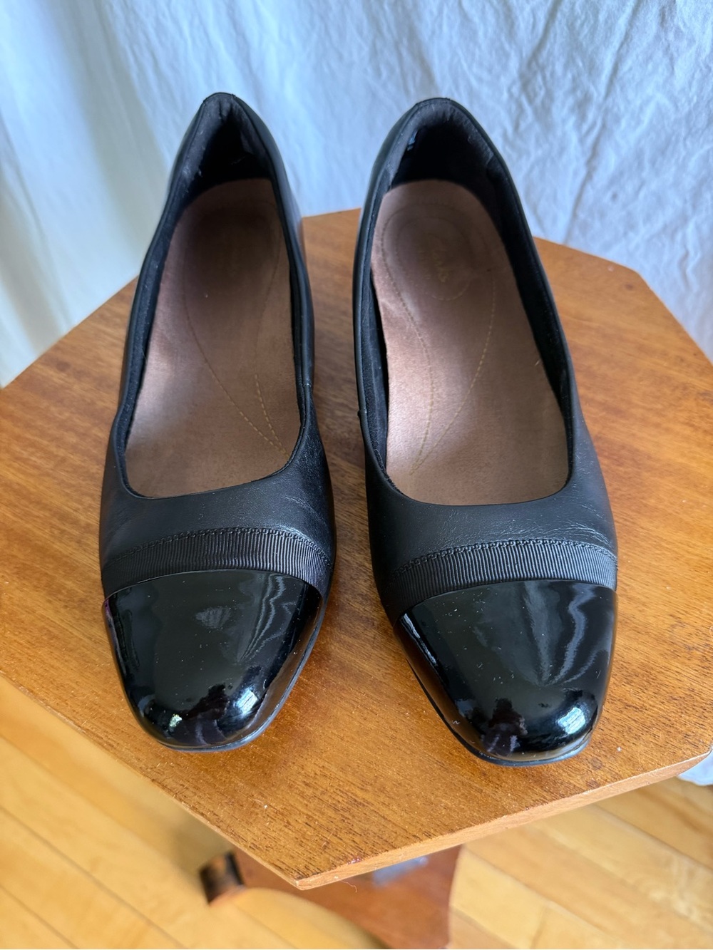 Clarks Black Patent Leather Juliet Monte with glossy patent cap toe.